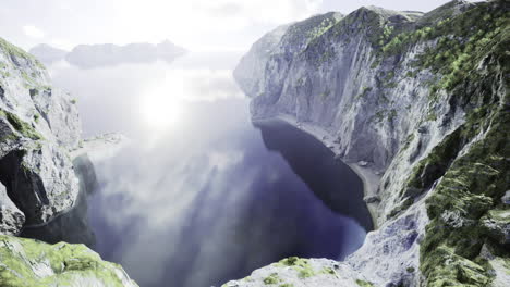 majestic cliffs reflect sunlight over serene body of water at dawn