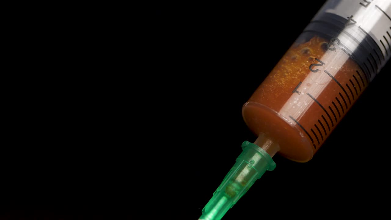 jeringa con la sustancia