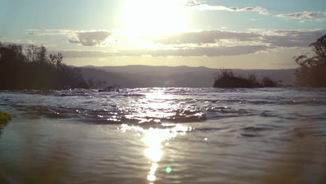sunset at the top of ebor falls waterfall in new south wales