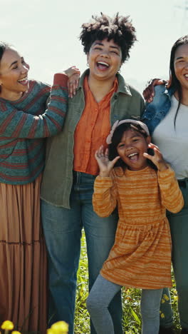 Happy,-travel-and-family-in-field-with-flowers