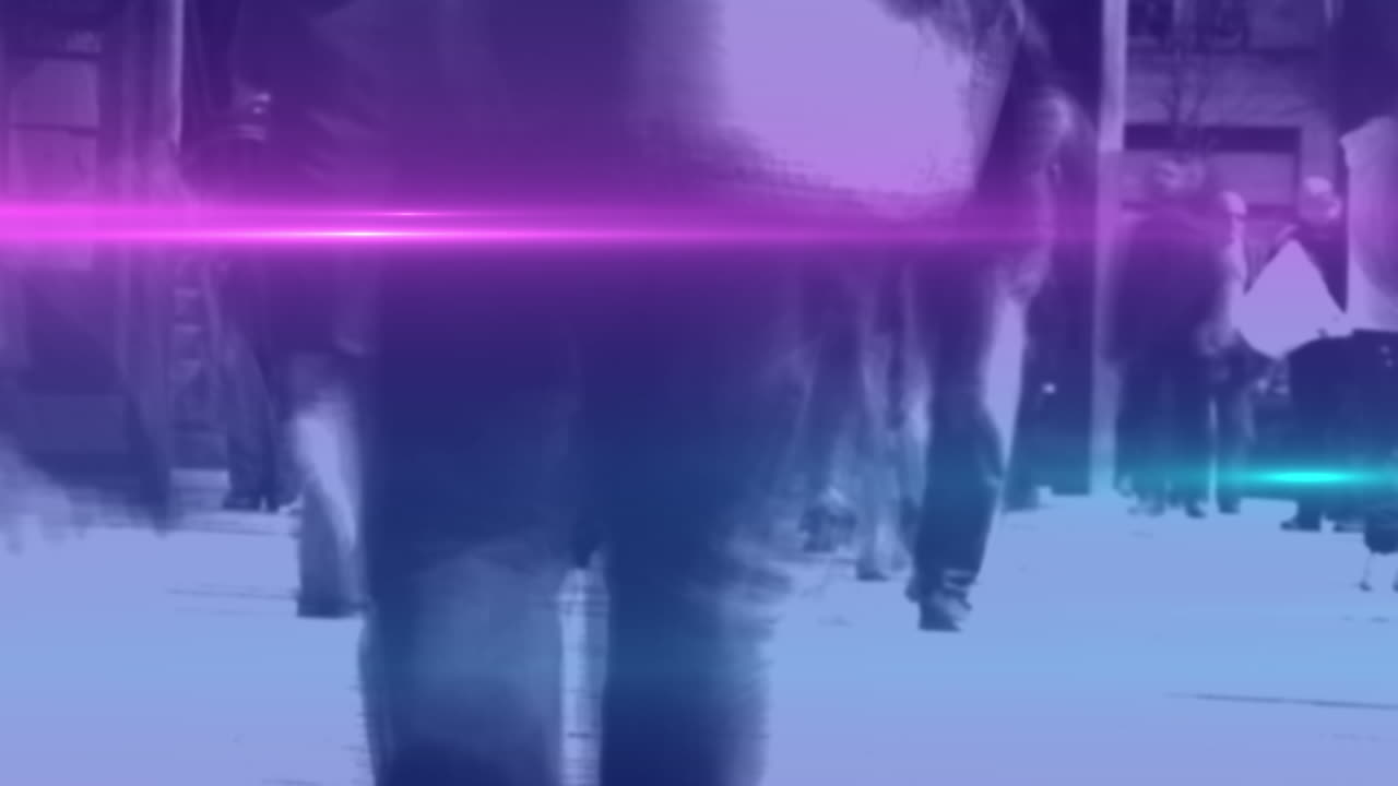 Video of coloured lights over crowd walking to work in street