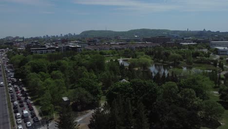 aerial view of mont royal and montreal skyline behind city park