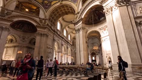 tourists explore the cathedral's grand interior