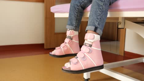 child wearing orthopedic shoes