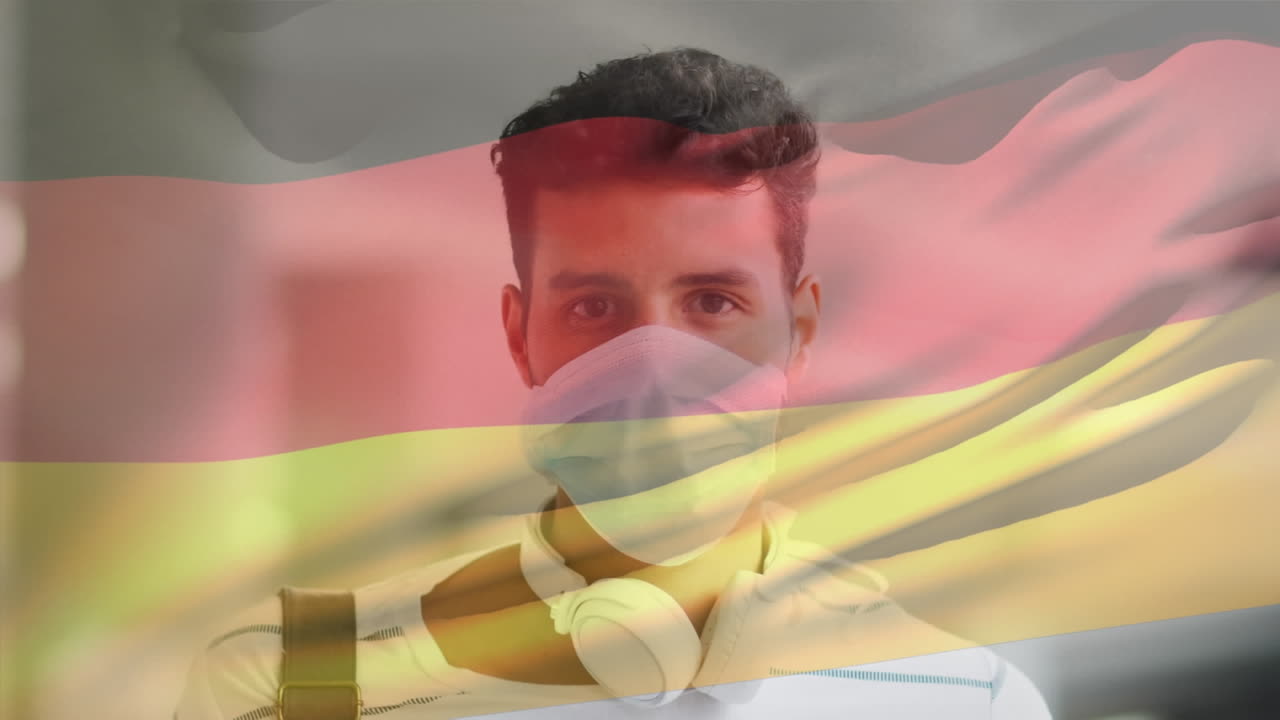 코로나 19 대유행 기간 동안 얼굴 마스크를 쓴 남자가 독일 국기를 흔들고 있는 애니메이션