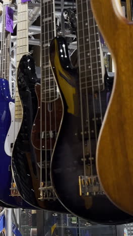 classical guitars in a musical instrument store. many musical instruments. the concept of instrumental music