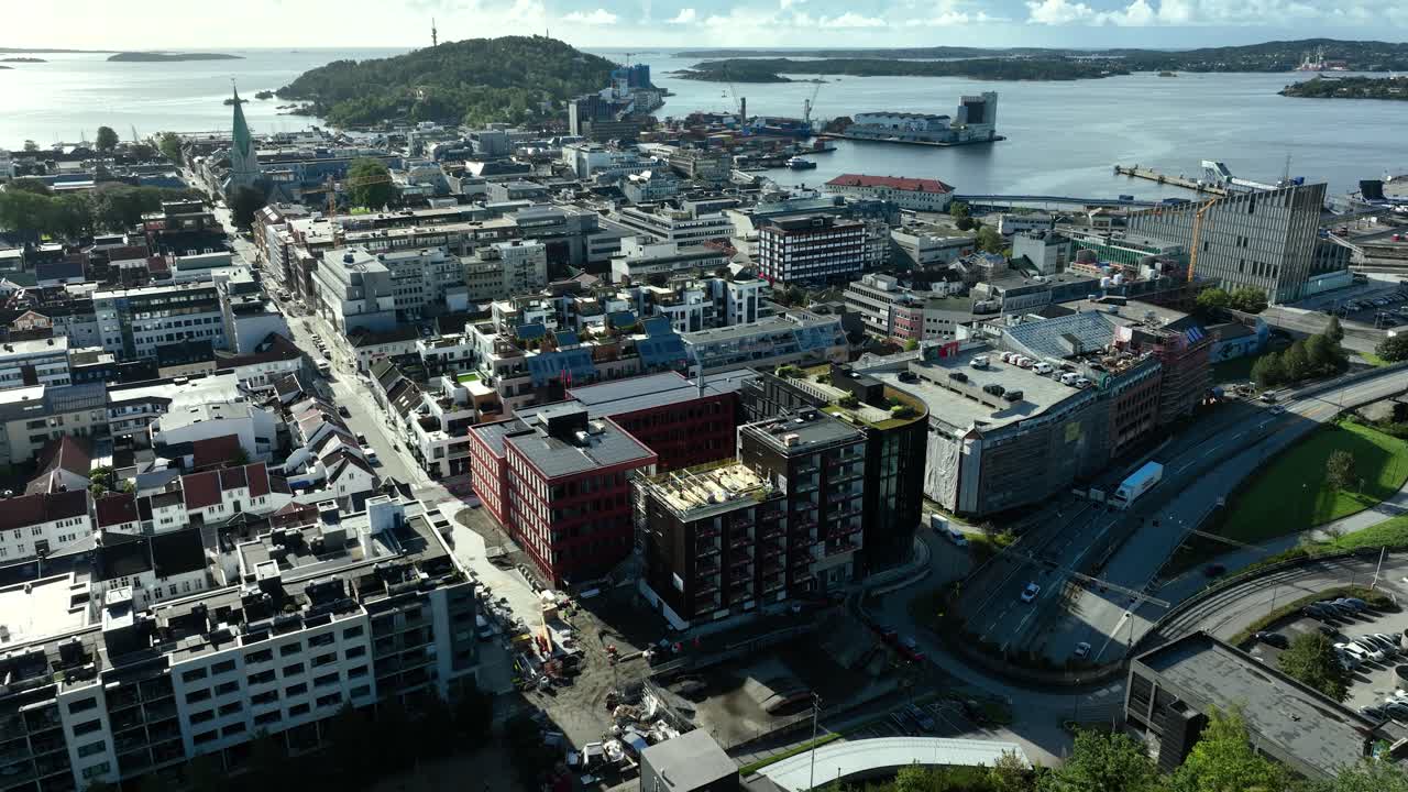Construction workers on rooftop working with solar power