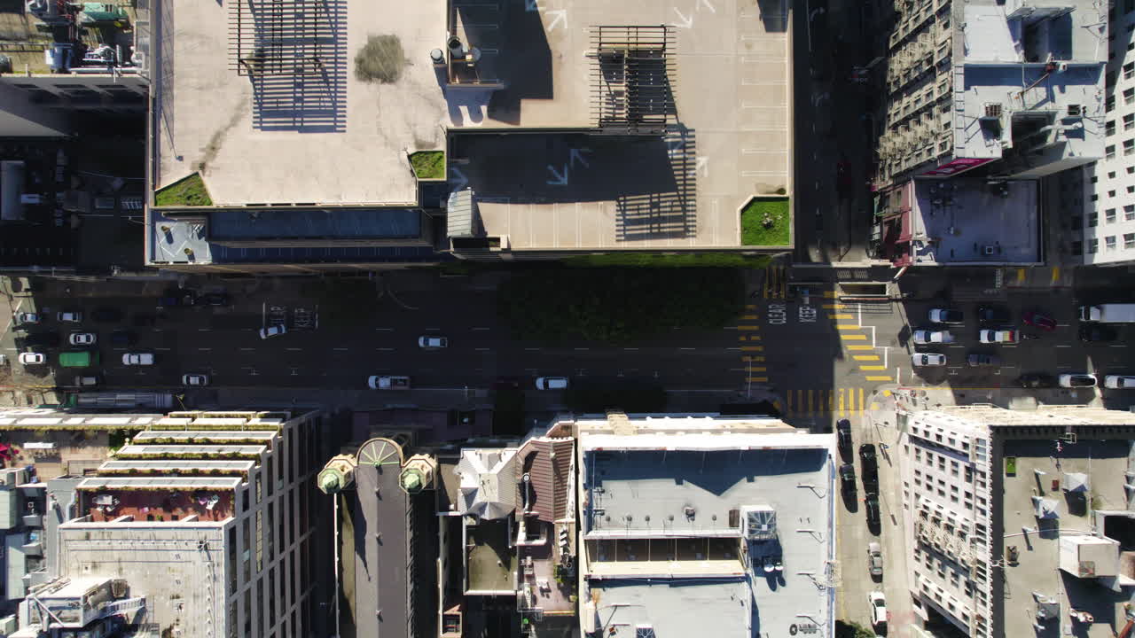 San Francisco USA, Top Down Aerial View of Street Traffic and Buildings Rooftops Crossroads of Bush and Stockton Street, Birds Eye Drone Shot