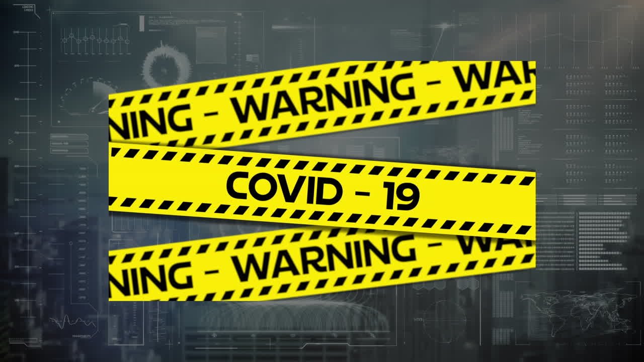Animation of covid 19 warning text over data processing and cityscape