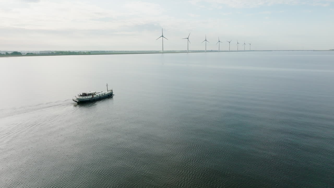Aerial view of The Luxemotor Dutch Boat traveling from the harbor of Urk in the province of Flevoland. Holland