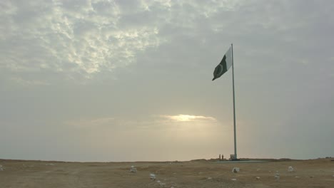 national flag of pakistan flying in gwadar balochistan at sunrise