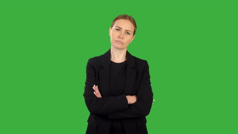 A-Serious-Angry-Business-Woman-Folding-Arms-With-Green-Screen-Background