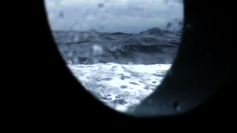 a rough storm through sailboat's porthole