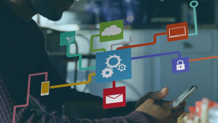 Animation of network of connections with icons over businessman using smartphone