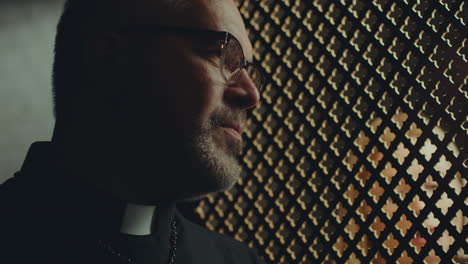 catholic priest giving advice to penitent during confession