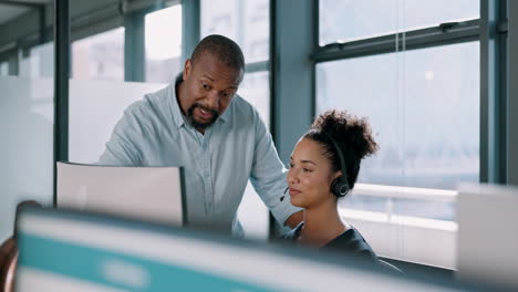 Call-center,-black-man-and-training-woman