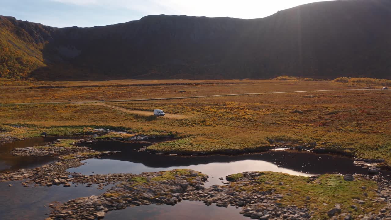 Scenic aerial view of Vestarelen, RV road winding through wilderness and mountains