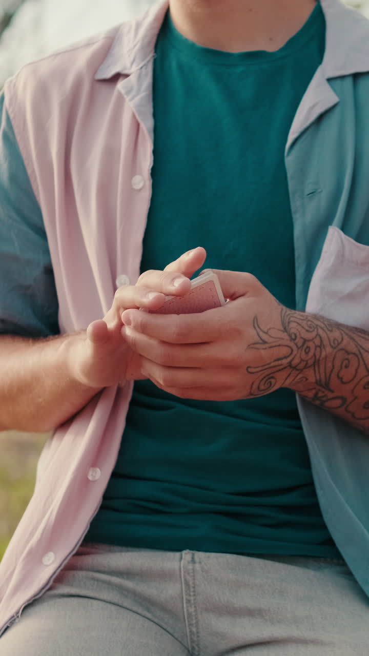 Friends Playing Cards at a Picnic