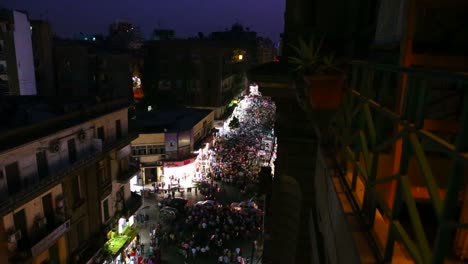 overhead view of a large nighttime protest rally in the stets of cairo egypt 1