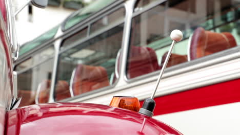 slider shot of details on 2 oldtimer bus coaches