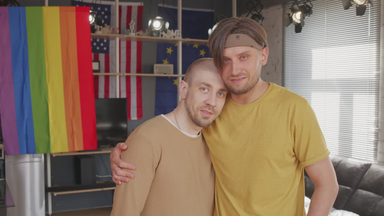 Loving Gay Couple Posing in Their Apartment