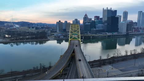 reveal of pittsburgh skyline from fort pitt tunnel exit onto fort pitt bridge