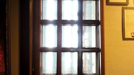 ornate wooden window in a historical interior