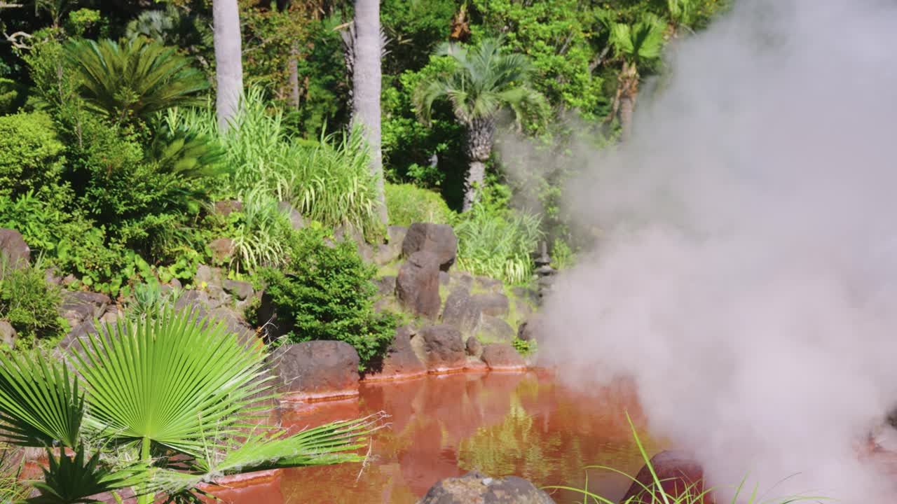Steam Boils out of Iron Oxide Pools at Umi Jigoku in Beppu, Oita Japan