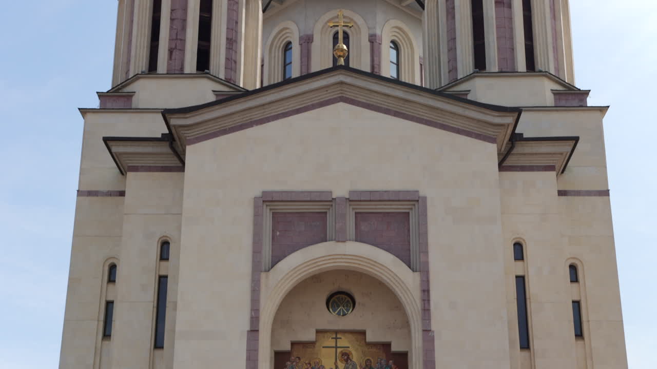 Architectural Facade Of The Orthodox Cathedral of the Lord Resurrection In Oradea, Romania. Panning Up Shot