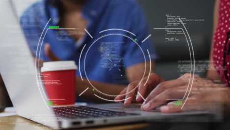 Animation of scope scanning over biracial woman discussing with male colleague over laptop at office