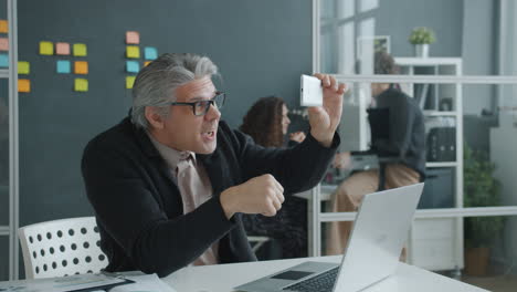 businessman having a video call in office