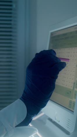 scientist working on a computer in a laboratory