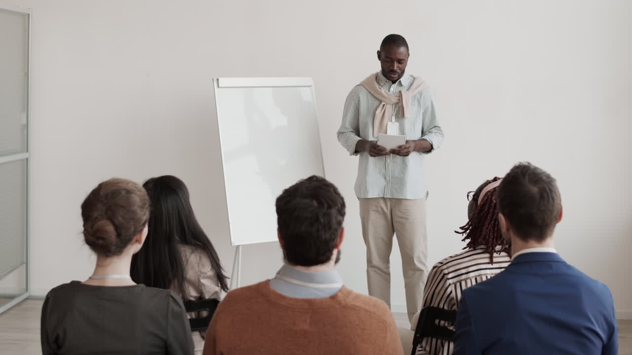 African Man Making Business Presentation