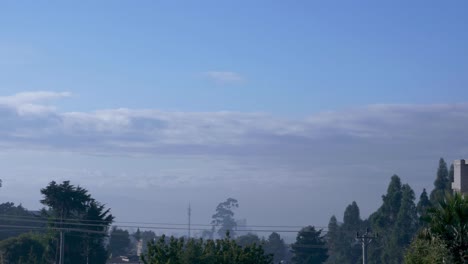 Time-laps-of-the-city-behind-cables-of-electricity