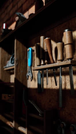 vintage woodworking tools in a dark workshop