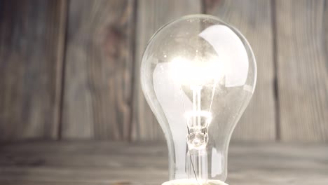 light bulb on wood background