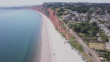 aerial static crop, flying toward red sandstone cliffs along the jurassic coast