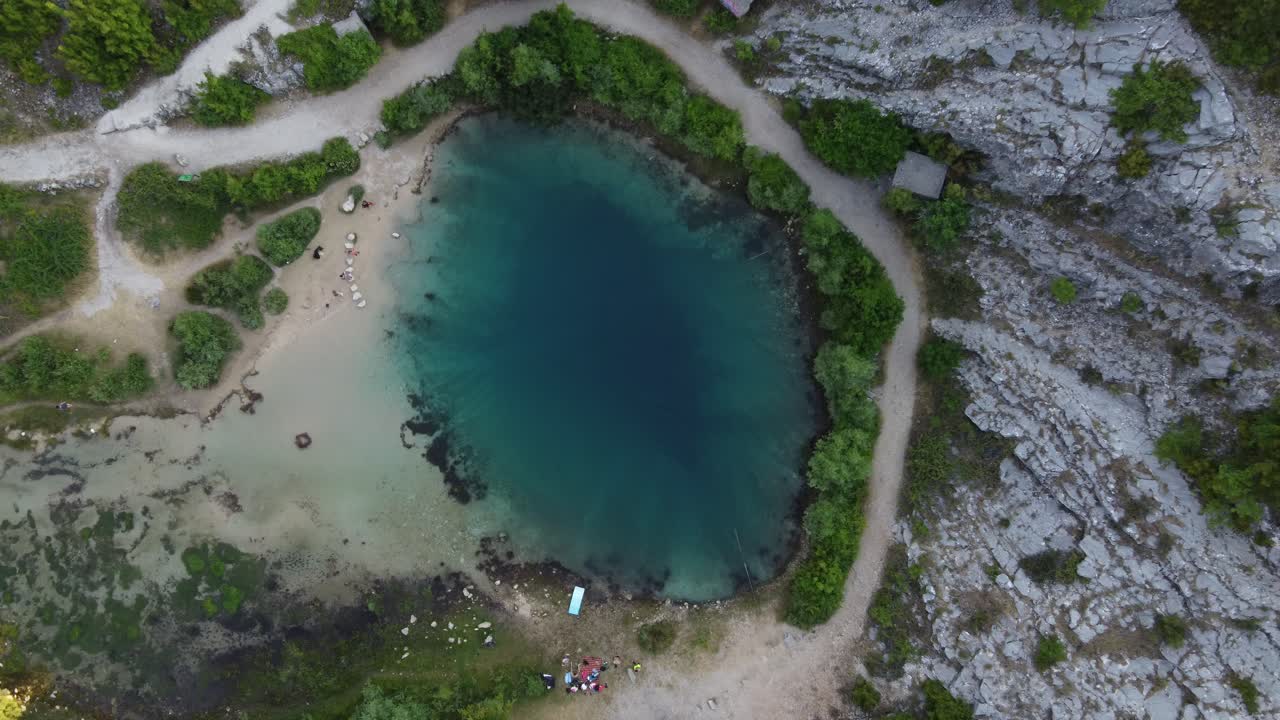 Cetina River Spring , also known as Eye Of The Earth, a cold karst spring looks like a dragon's eye, Croatia