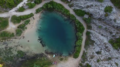 Cetina-River-Spring-,-also-known-as-Eye-Of-The-Earth,-a-cold-karst-spring-looks-like-a-dragon's-eye,-Croatia