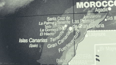 close-up of a monochrome map showing the canary islands, morocco, and western sahara