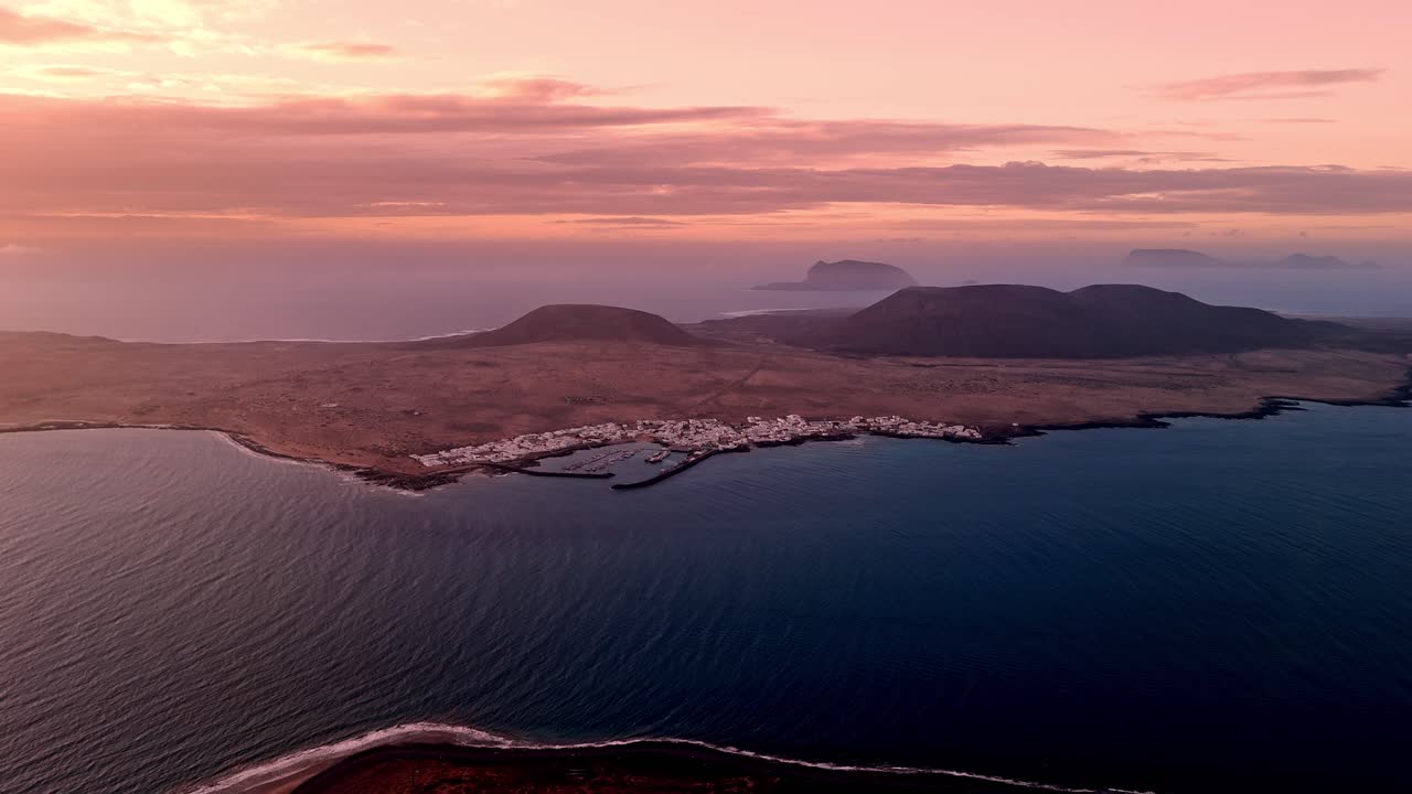 Breathtaking aerial drone footage captured at sunset from El Mirador del Río in Lanzarote, Canary Islands.