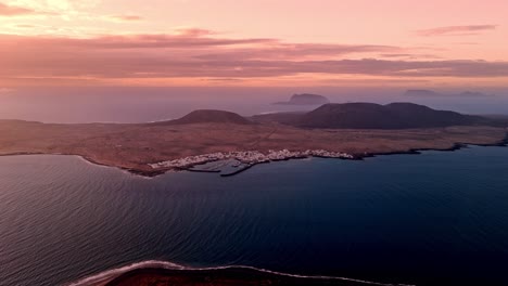 breathtaking aerial drone footage captured at sunset from el mirador del río in lanzarote, canary islands.