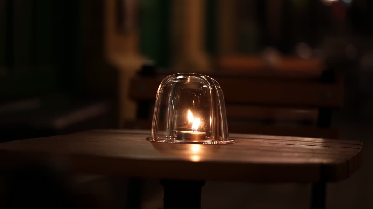 Candle light on a table at night