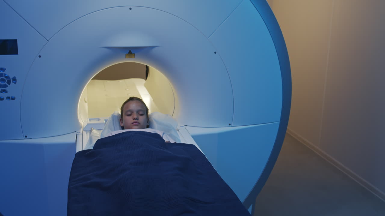 Girl Doing MRI Scanning Procedure