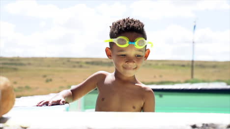 South-African-Boy-Splashing-in-Pool