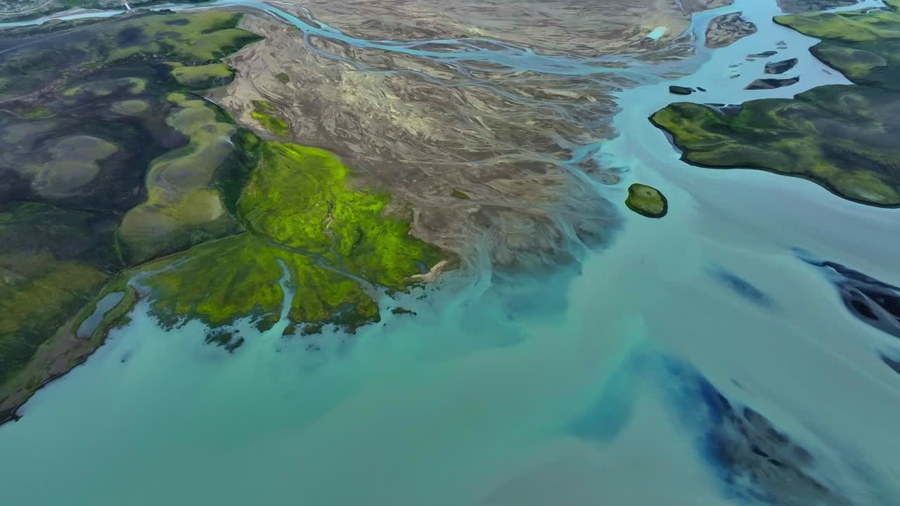 Aerial view of glacial rivers in Iceland abstract pattern South Coast drone nature landscape