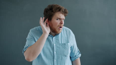 man listening carefully