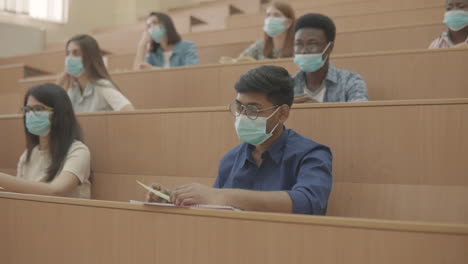 multicultural group of university students in class 1