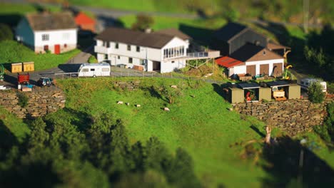 a farm on a steep hill in rural norway