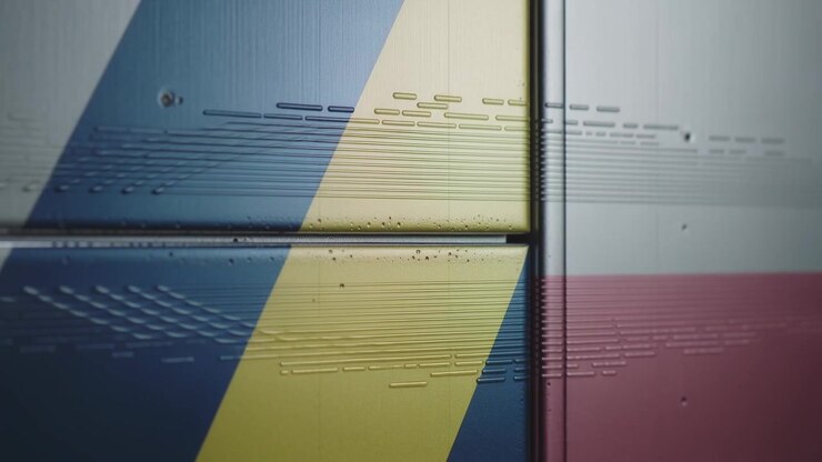 Forming striped metal panels showing streaks originating from vertical rail in studio closeup pits